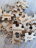 Student class keyrings puzzle pieces with a star