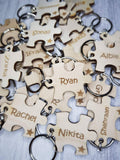 Student class keyrings puzzle pieces with a star